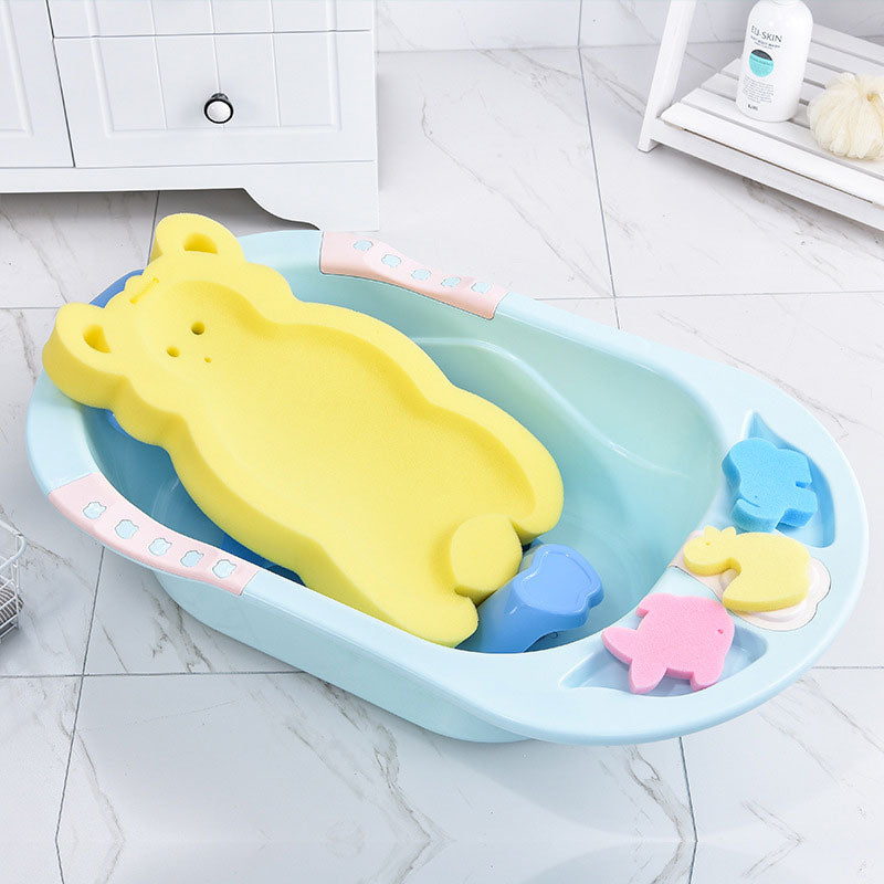yellow baby bath mat in bath tub